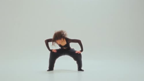 Expressive Contemporary Dance By Young Girl In Minimalist Studio