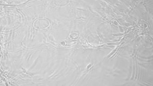 Transparent Clear Calm Water Surface Texture with Waves Splashes and Bubbles