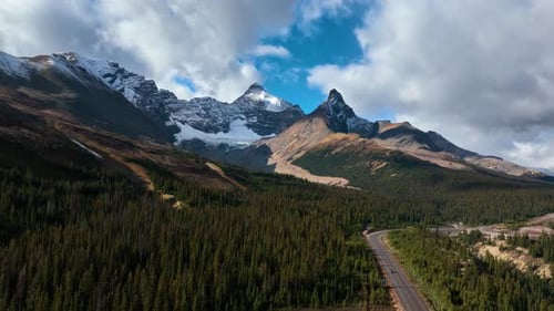 The road in the mountain valley. Traveling by car. Banff National Park, Canada