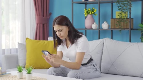 The young woman arguing in the messaging is angry.