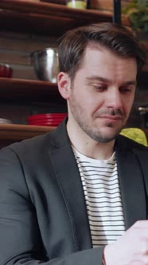 Pensive Man in Caf Reflecting on Life Choices