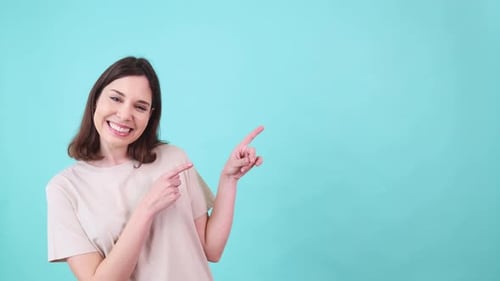 Smiling Woman Points to the Right