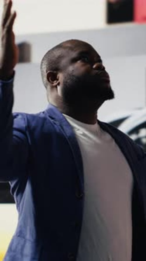 Vertical Video Black Spiritual Adult Meditating on Faith and Serenity in a Pose of Worship