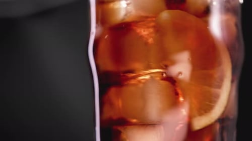 Iced Beverage with Orange Slice Close Up