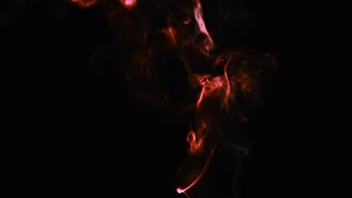 Realistic cloud smoke with streamline pattern. Abstract red smoke on dark background in slow motion.