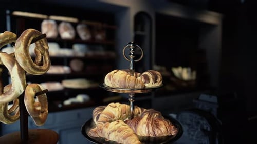 Table With Two Trays of Pastries in a Modern Cafe