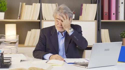 Stressed adult talking in an office or home office