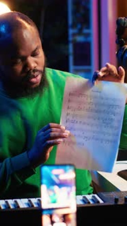 Man Explaining Sheet Music For Online Music Lessons
