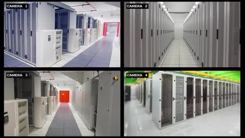 Four security camera views of business computer server room interiors, slow motion