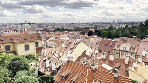 An Aerial View of a City with a Lot of Buildings and Roofs