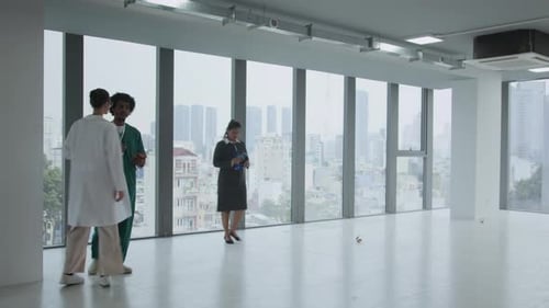 Team of Medical Specialists Coworking in Clinic Corridor Time Lapse