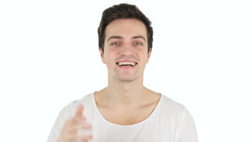 Man Waving Hand and Smiling on White Background