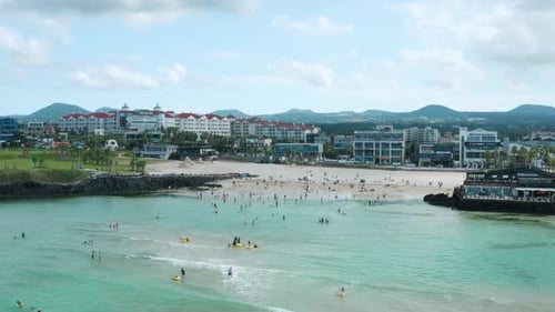 A famous beach scene on Jeju Island, South Korea. Drone view. Hamdeok Beach.
