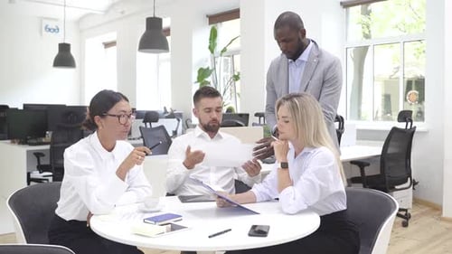 Multiethnic Business People During Meeting in Modern Office