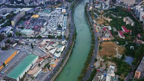 Rush hour at streets and highways of Tbilisi near Kura river