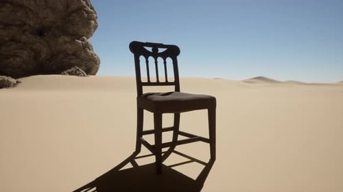 A Chair Sitting in the Middle of a Desert