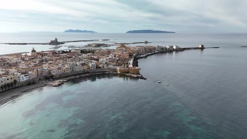Stunning Aerial View of Tranquil Coastal Town with Cloudy Dusk Reflection
