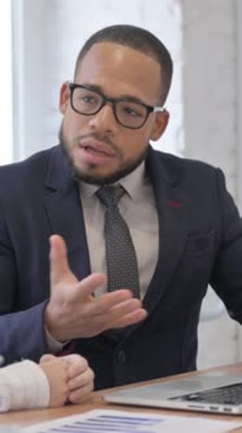 Angry Businessman Talking with Businesswoman in Office, vertical video