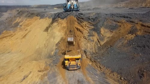 Heavy Machinery Operating Efficiently in the Complex Mining Site Environment and Terrain Stock Clip
