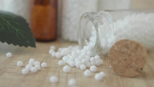 Homeopathic Medicine Balls with Glass Bottle and Leaf