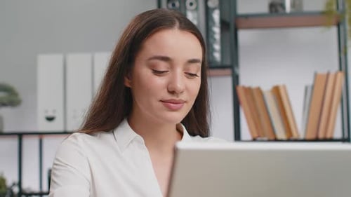 Closeup Businesswoman Freelancer at Office Workplace Works on Laptop Computer Sends Online Messages