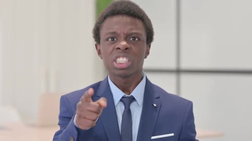 Angry Man Yelling in Suit, Close Up