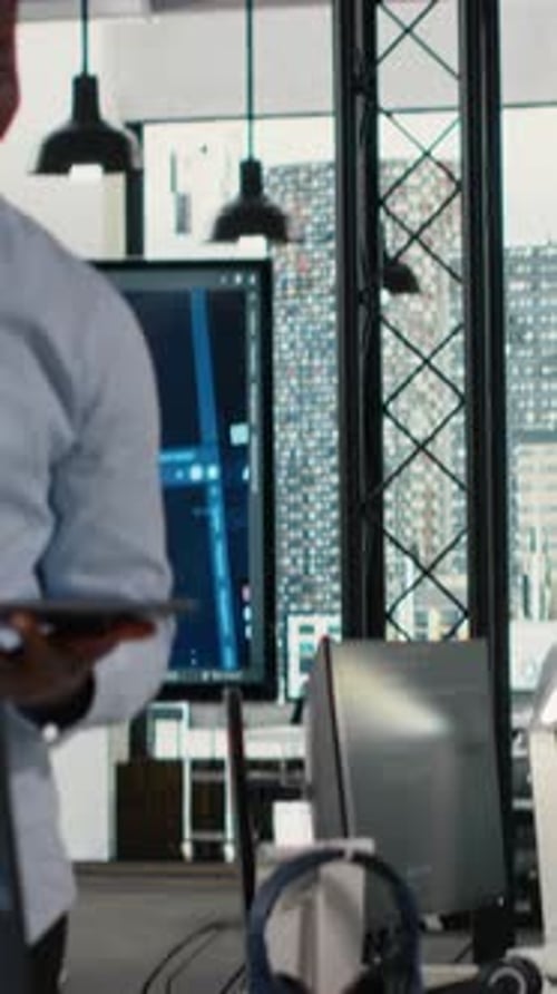 Vertical Video Smiling IT Staff Members in Office Using AI to Optimize Company Systems