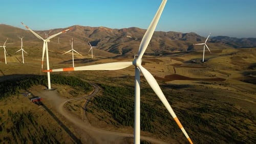 Aerial View of Wind Turbines in Rural Landscape
