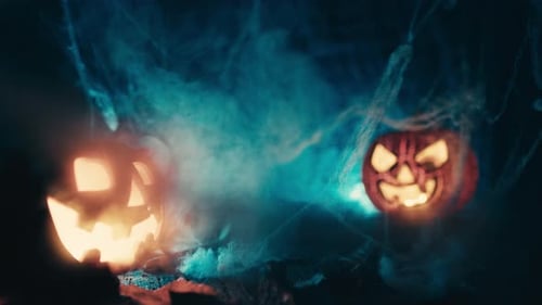 Glowing Pumpkins with Spooky Smoke and Spiderwebs