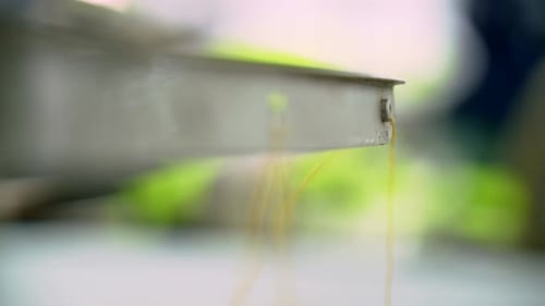 Macro Shot Of A Sewing Machine During Production Of Textile Manufacturing