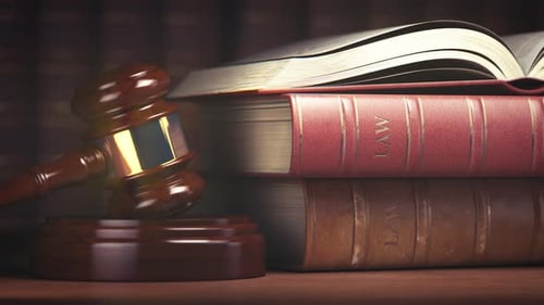 Justice Concept: Animated Gavel and Law Books