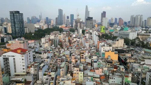Aerial of Ho Chi Minh City Skyline with Dense Housing and Modern Skyscrapers