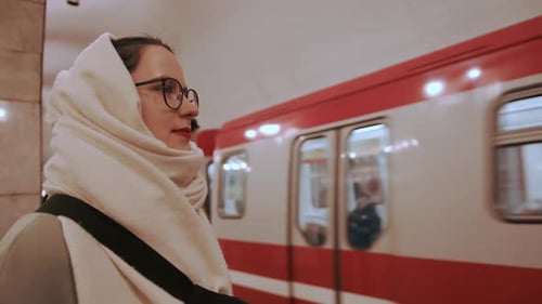 Charming Young Girl Stands on Subway Platform and Waits for Train to Stop Most Environmentally