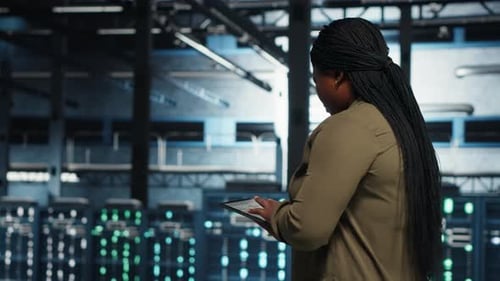 Data Center Technician Automates Data Center Operations with Tablet Device in Data Center