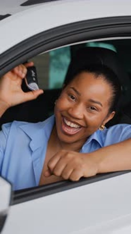 Happy Customer Showing New Car Key