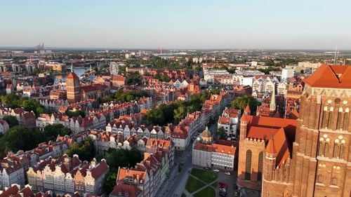 Aerial Video Shot By Drone Over the Historic Tourist Center of Gdansk the City Hall and the