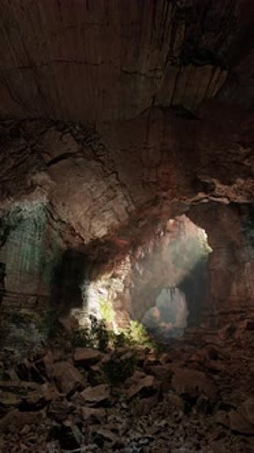 Sunlit Cave With Rocks and Water