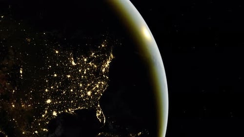 Planet Earth Rotating from Night to Day with City Lights