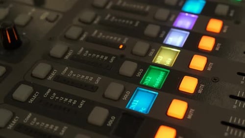 Working on a large sound mixer