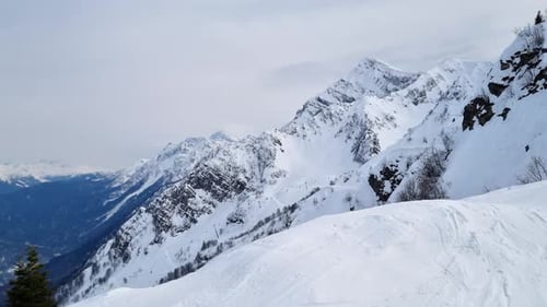 Aerial View of the Snowy Peaks of the Rocky Mountains Range Winter Snowy Natural Landscape