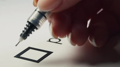 Woman Checking Pay Taxes Box on Paper FormTimely Tax Payment Compliance Concept