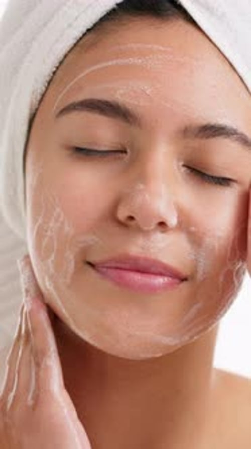 Skincare, cleaning and beauty with woman and soap for facial, self care and wellness