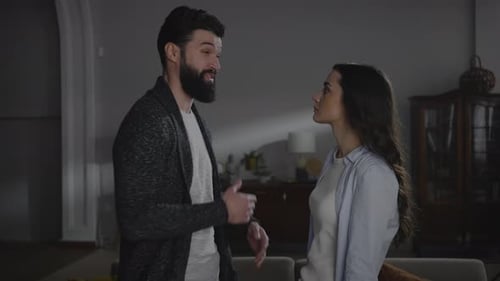 Couple Having a Difficult Conversation Indoors