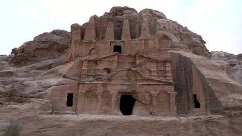 Slow Pan Shot of Ancient Tempe Carved Out of Sandstone in Nabatean City Petra