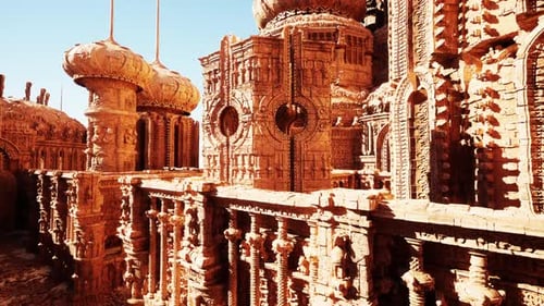 Detailed View of the Intricate Stone Carvings on the Walls of an Ancient Temple