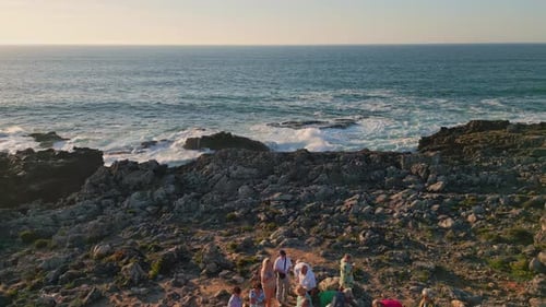 Group People Standing Coast Washed Stormy Ocean Drone View Rocky Sea Shore