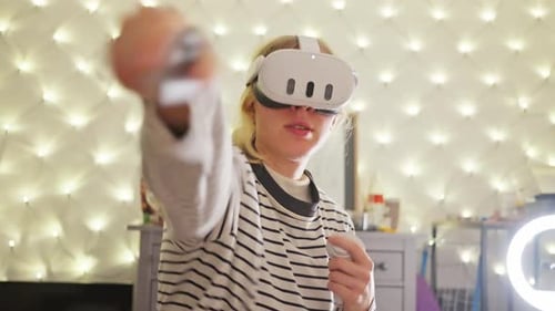 Young Adult Using Virtual Reality Headset at Home