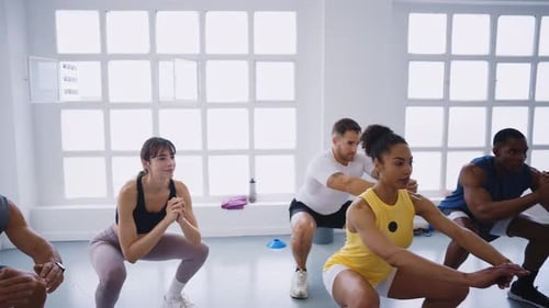 Professional athletes developing strength and endurance through synchronized exercises