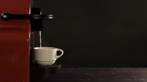 Espresso Machine Fills Mug with Fresh Coffee