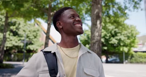 Thinking, black man and student outdoor on college campus with smile, environmental study